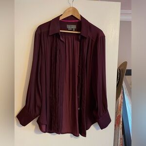 Plum colored oversized blouse from Anthropologie.